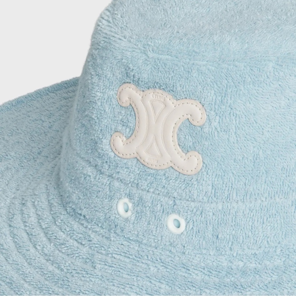 CELINE Triomphe wide brim hat, adjustable draw string in baby blue
Never worn.